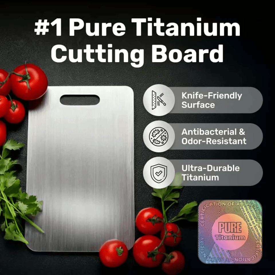 close-up dramatic studio-lit scene of a sleek stainless titanium cutting board being used to slice a